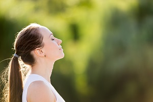 Calm,Beautiful,Smiling,Young,Woman,With,Ponytail,Enjoying,Fresh,Air